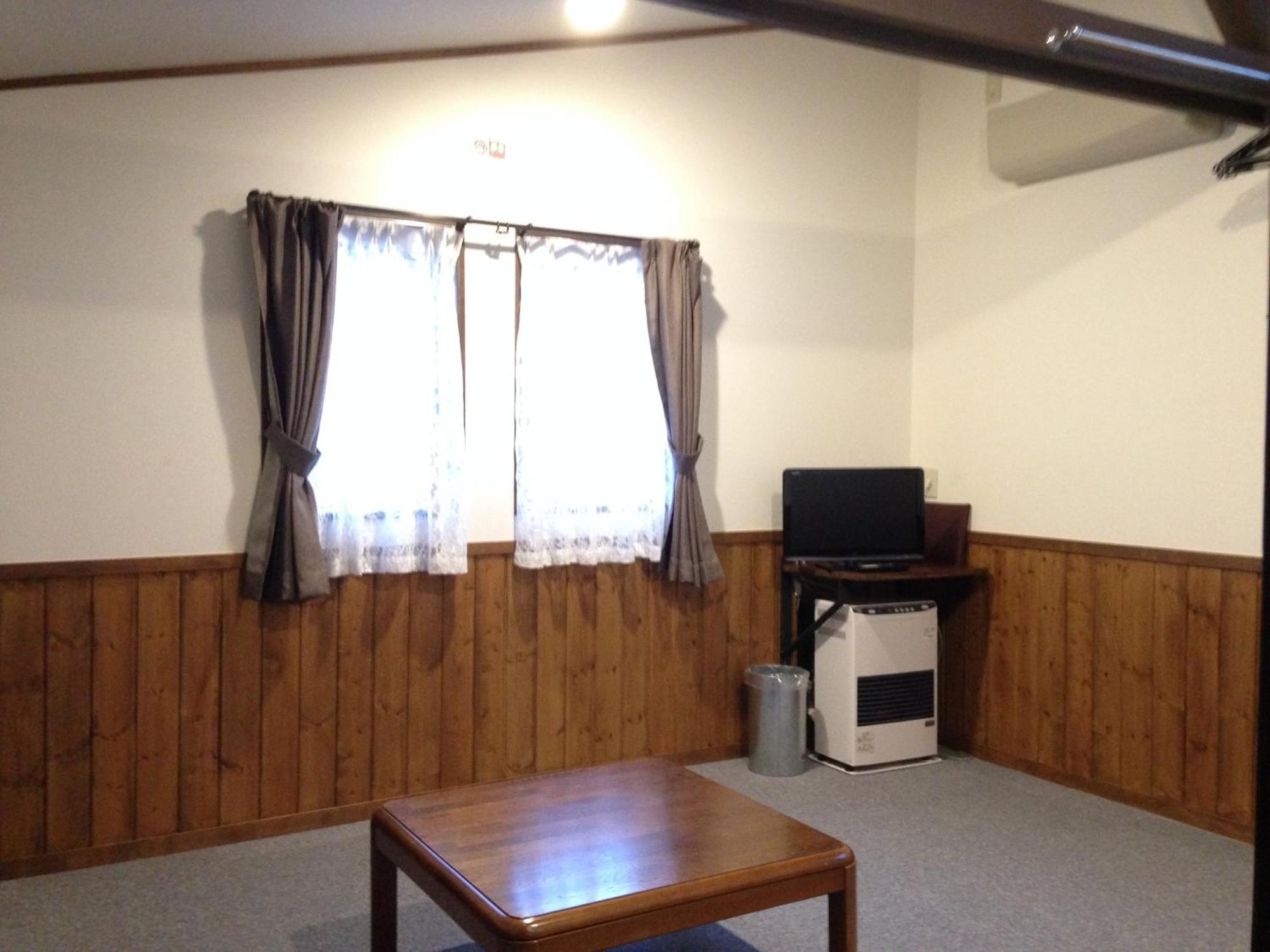 Community House Tyrolien Hotell Hakuba Rom bilde